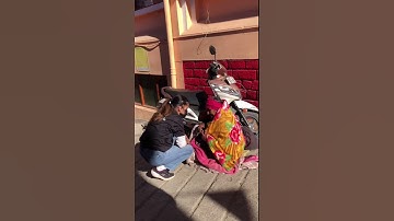 Shoolini university students attempting to help the ones in need as a part of there social project.