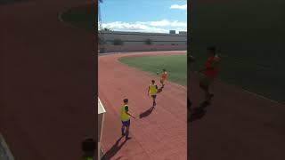 Soccer Goalie Takes a Slide on Athletics Track