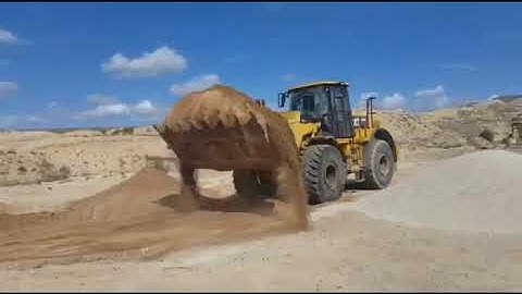 CAT 966H  VERY TOUGH WORK IN THE QUARRY