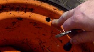 Installing a tire valve stem at home without removing or breaking tire bead.