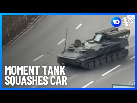 Russian Tank Squashes Ukrainian Car In Kyiv | 10 News First