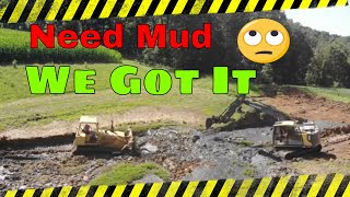 Mud mud mud we got mud cleaning out and enlarging a 80 year old pond