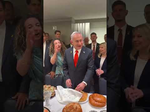 Welcoming Shabbos: Israeli PM Netanyahu tosses Shirayim from the Challah as per custom of the rebbes
