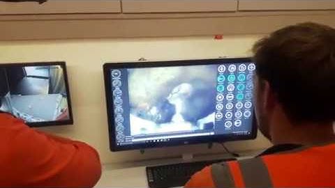 Remove grout from inside 8" sewer main pipeline with high pressure water jet