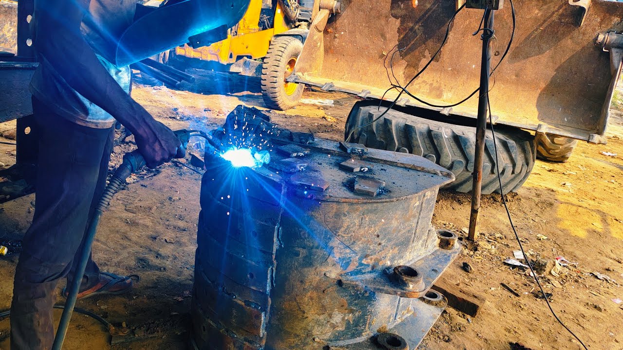 JCB 3dx bucket hardfacing mig welding By Bombay Jcb Garage - YouTube
