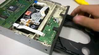 Disassembling a CD/DVD Reader - Openning the tray. Wealth
