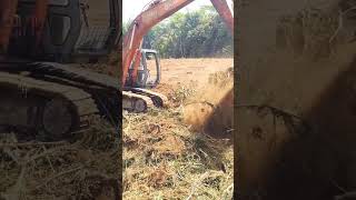 how an excavator works