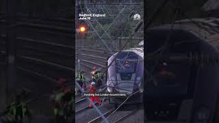 At least one person killed after two passenger trains collide north of London