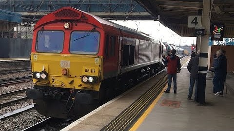 DB Schenker Class 66 66117 hauls RHTT and a rake of wagons then LNER Azuma speeds through Doncaster