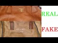Prada bag real vs fake. How to spot counterfeit Pranda handbags and purses