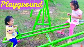 Playground for Kids with Seesaw, Swing and Slides at the Park