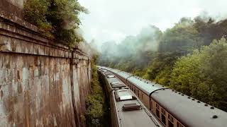 Rare parallel running: steam v diesel on the mainline in Bath