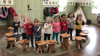 Indy and the kids saying the pledge of allegiance at the schoolhouse - June 2019