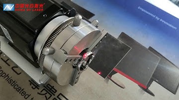 Ovlaser-20W fiber laser marking machine mark Titanium ring by 69mm rotary device.