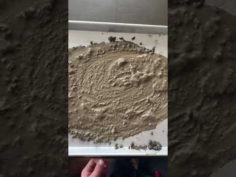 Pre-writing shapes fun in the mud