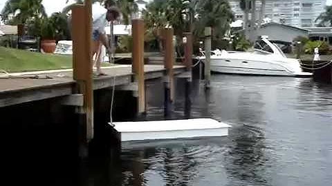 AccuDock Floating Docks for a Stable Work Platform Washing a Boat