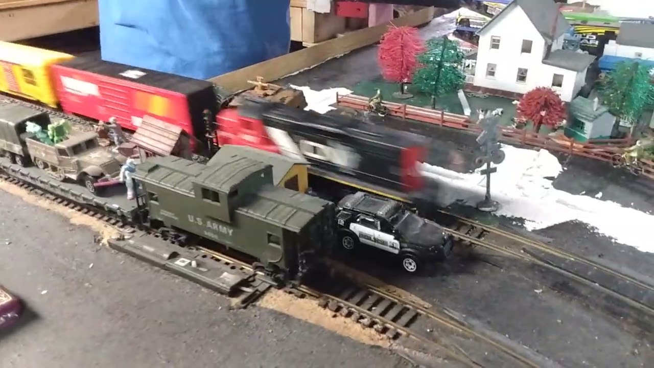 Little Man and Daddy playing on the layout 