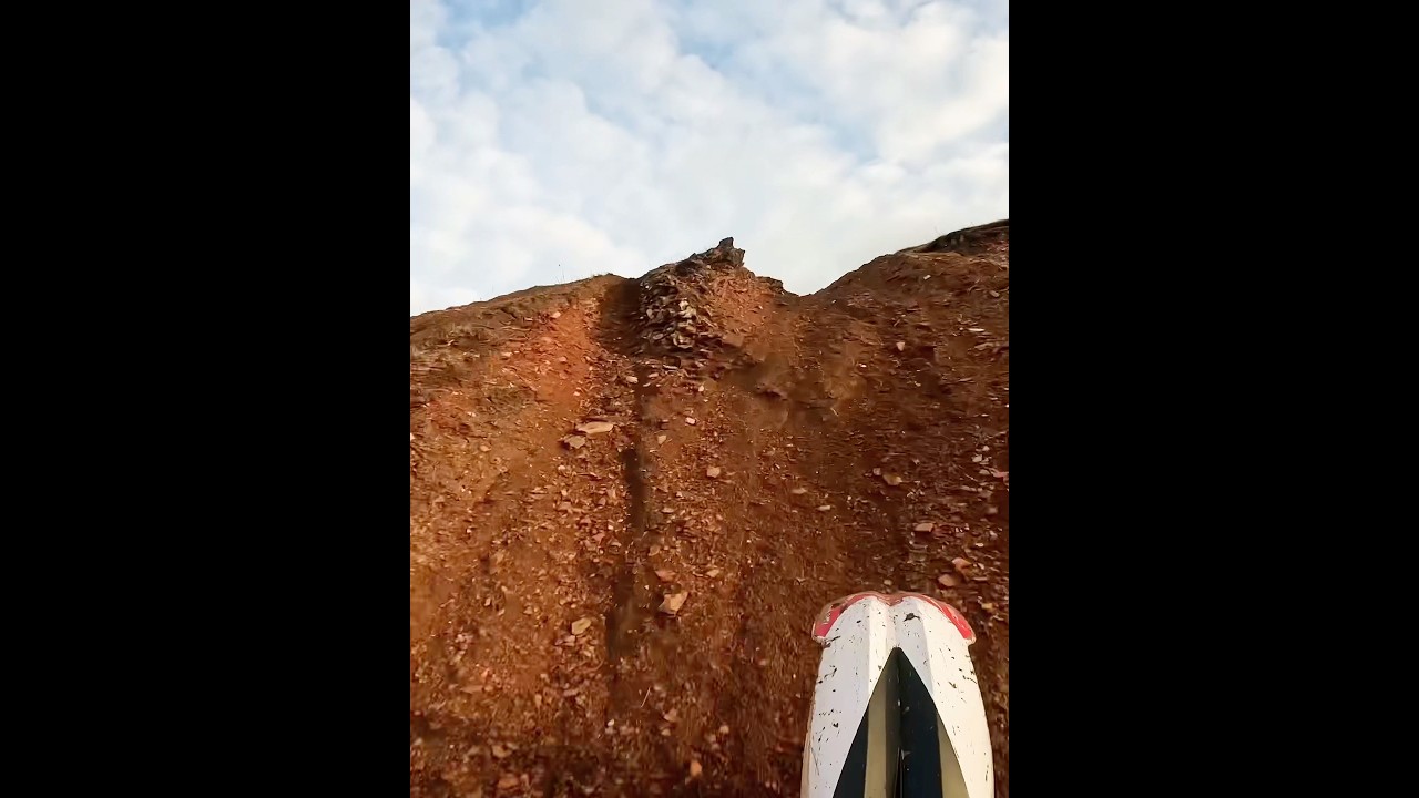 125 2 stroke getting air on hill climb 