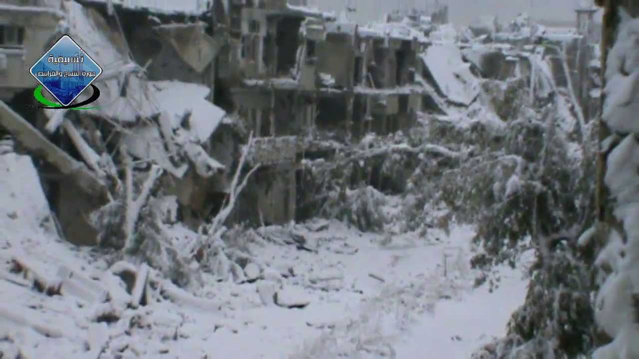 حي القرابيص بين برد الشتاء وتساقط الثلوج والدمار المرعب الذي حل به11_12_2013