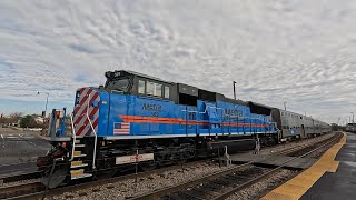 Metra's SD 70machs & CPKC Holiday Train at Clinton, IA