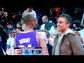 Kobe bryant goes up to rick fox during the warriors game and shakes his hand