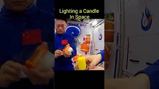 Lighting Burning Candle In Space Station