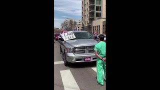 Man blocks anti-lockdown protester
