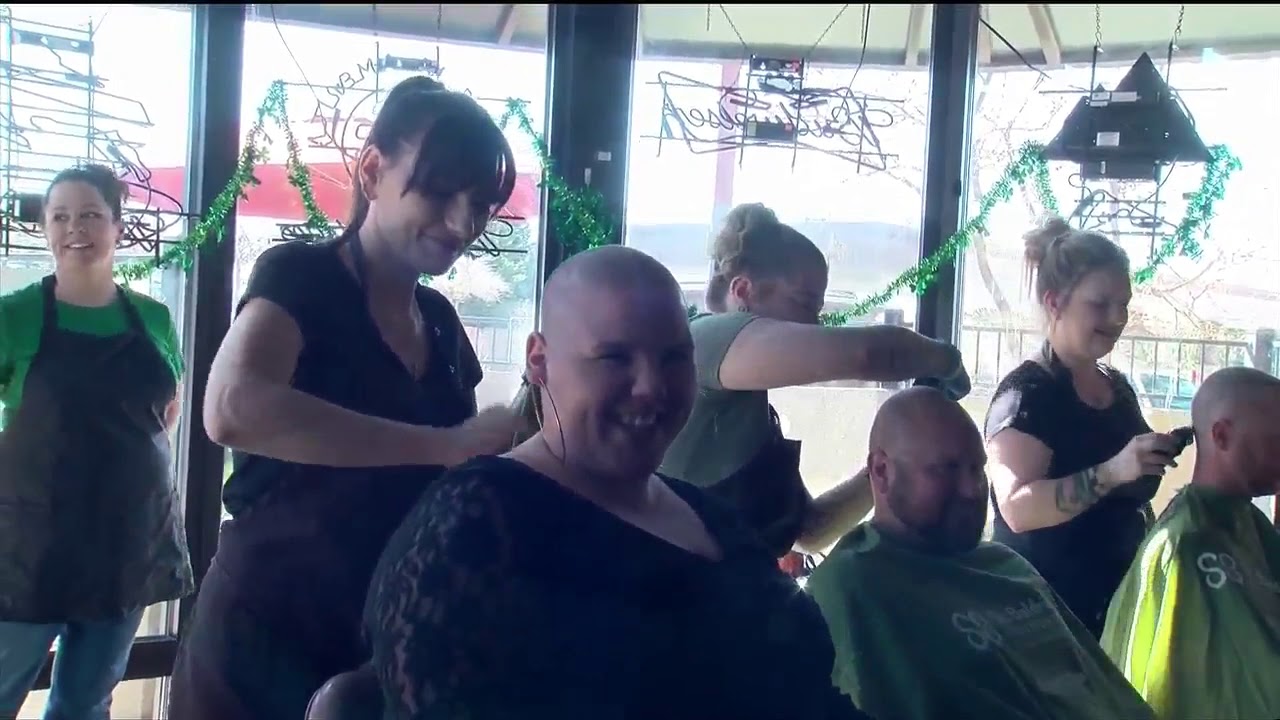 Charity head shaving event raises thousands for cancer research YouTube