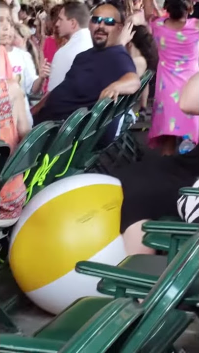 Woman Pops Kids Beach Ball at Concert || ViralHog