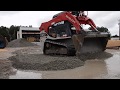 Skid Steer Filling Pot Holes