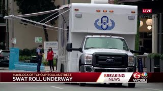 SWAT roll underway at Old No. 77 Hotel in CBD with armed, barricaded suspect