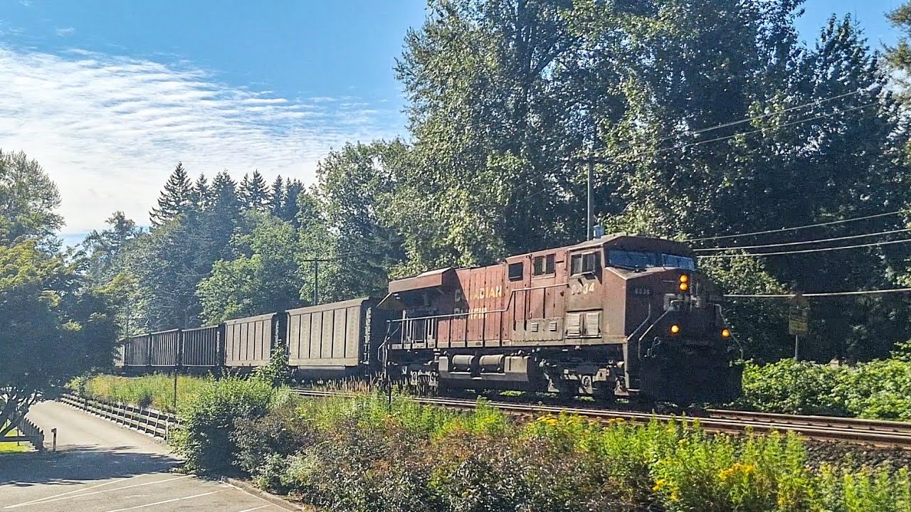 Long CPKC Coal Train Rolls Through Fort Langley British Columbia Canada 