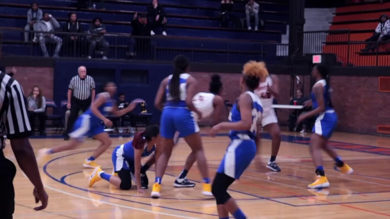 Evanston Township High School Varsity Women's Basketball defeats Simeon