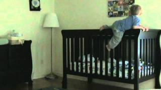 Devin Climbing Out Of Crib