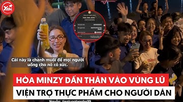 Hòa Minzy dấn thân vào vùng lũ nửa đêm để viện trợ thực phẩm cho người dân có sức đắp đê ngăn lũ