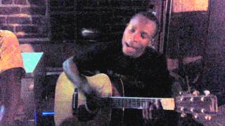 Bar tender in Malawi playes african song 'Mlamulanda' on acoustic guitar