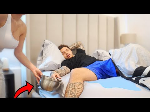 Putting My Boyfriends Hand In WARM WATER While He Sleeps… ** WETS THE BED!? **