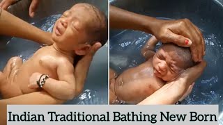 Indian Traditional Bathing New Born