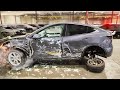 TESLA TOTALED IN ROLLOVER CRASH