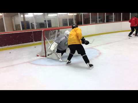 4 pucks battle with Olle Eriksson-Ek - Coach Erik Granqvist