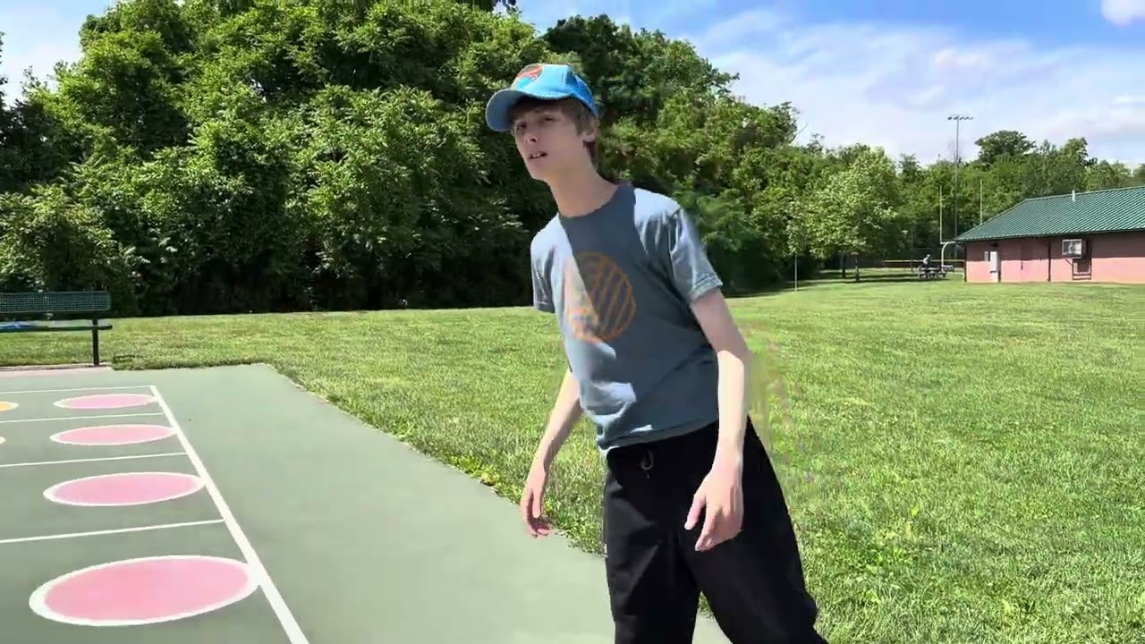 Autistic Teen Practices Shooting Hoops at Adaptive Basketball Court with Moms!