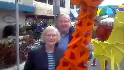 Bill and Rita with giraffe at Art Festival