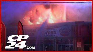 Fireworks go off during four-alarm fire at store in Etobicoke