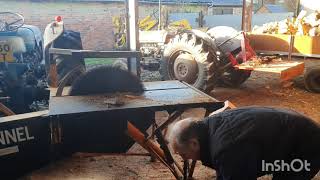 Fordson Super Major tractor, McConnel PTO sawbench, sawing beech into logs.