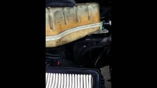 Repairing  cooling system on 2003 Kia Sorento.