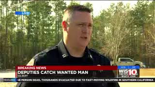 Live media briefing after arrest of federal fugitive