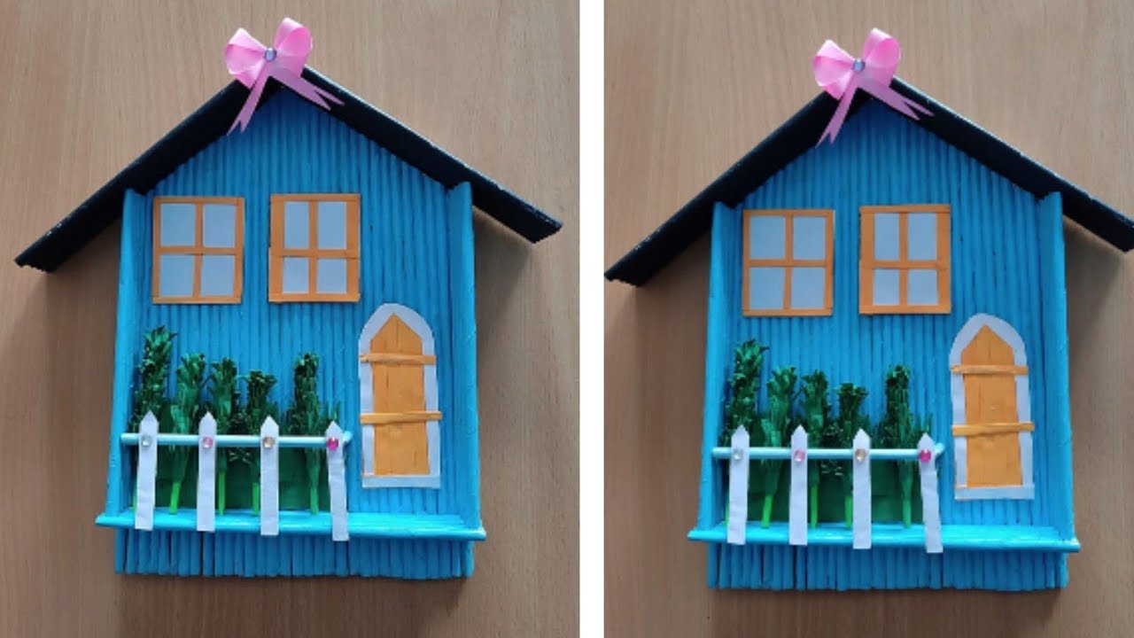 News paper wall hanging house 