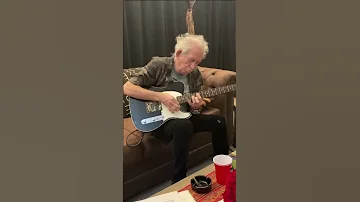 Keith Richards plays Before They Make Me Run backstage before the show in Minneapolis