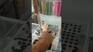 Cara cepat menghitung kancing dengan alat bantu hitung kancing