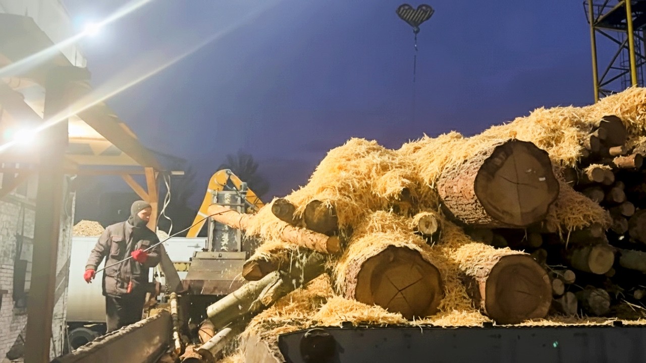 Mesmerizing Wood Crushing under Night Lights